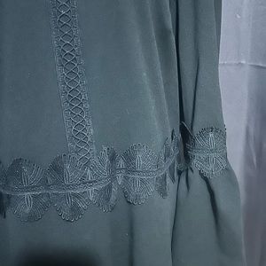 Black long sleeve dress with embellishments